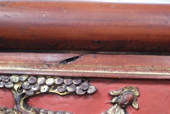 A pair of 19th century Chinese carved wood and glazed panels W.40cm
